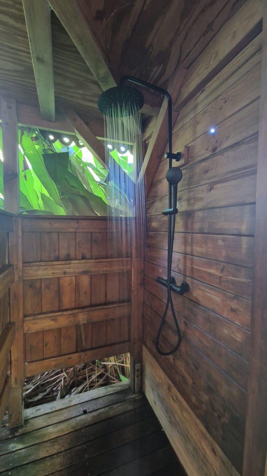 hammock and outside shower of the villa Kariakou